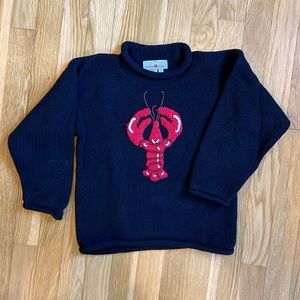Adorable handknit navy cotton sweater with roll neck.